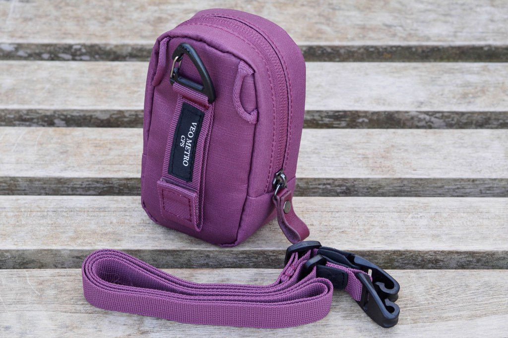 Vanguard VEO Metro Small Compact Camera Bag showing clip and belt loop. 