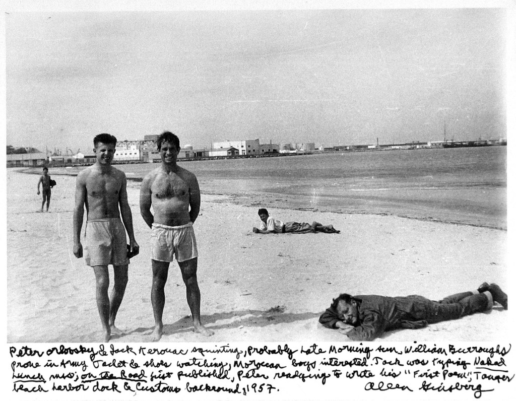 Allen Ginsberg, Peter Orlovsky & Jack Kerouac squinting, William Burroughs, 
Moroccan boys interested, Tanger, 1957. 
Early gelatin silver print, 7 3/8 x 9 1/2 in. 
© Allen Ginsberg Trust, Courtesy of Howard Greenberg Gallery, New York