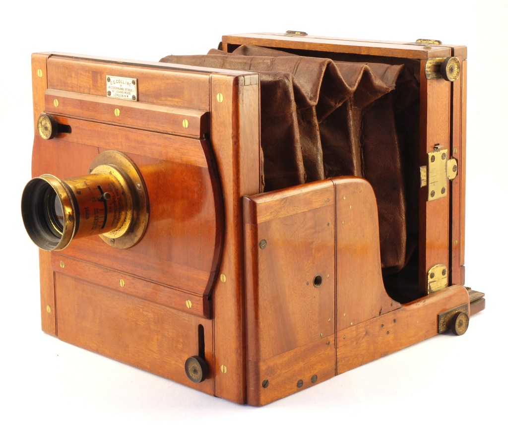 The English Collins Half-Plate Tailboard camera, c.1890, was typical of the kind of cameras that used dry plates