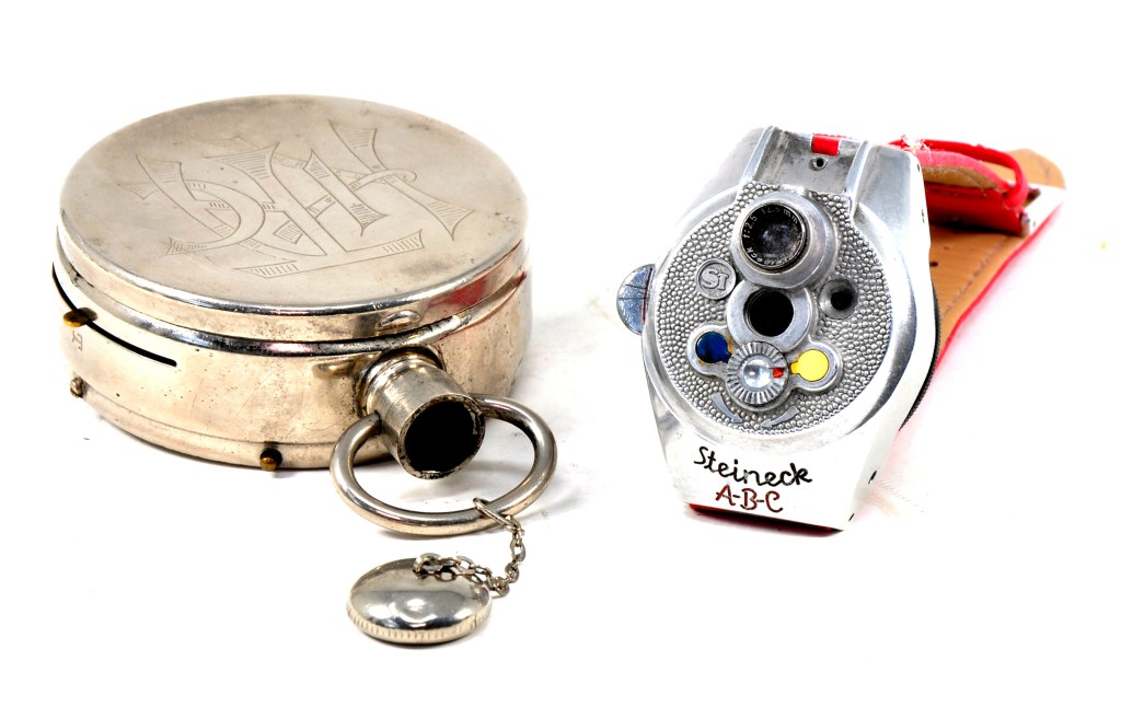 Disguised cameras were very popular from the earliest days of photography right up to the current digital age, and watches made popular starting points for unusual designs. Here are the Ticka from 1906 (left) and the later Steineck ABC from 1948
