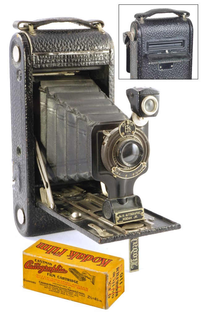 In 1914, Kodak introduced the Autographic Back. With the use of special autographic film, a stylus and a trapdoor in the camera back, it became possible to ‘write’ notes on the film’s backing paper which would be transformed into writing on the rebate between frames of film