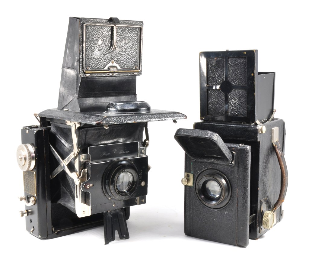 Before the 35mm SLR became popular, reflex cameras were very different, as shown here with the 1920 Patent Klapp Reflex (left) and the 1930 Thornton Pickard Rubyette No.1
