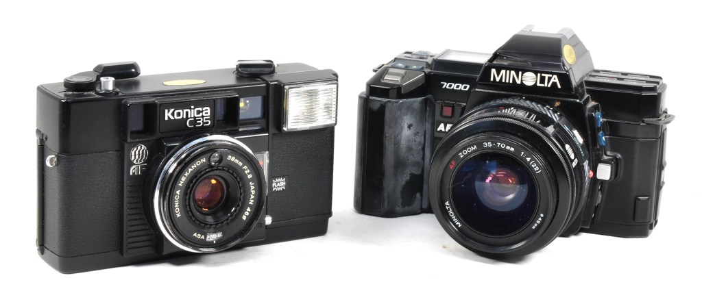 Two autofocus landmarks: 1977 Konica C35AF, the first autofocus camera (left), with the 1985 Minolta 7000, first with body integral autofocus