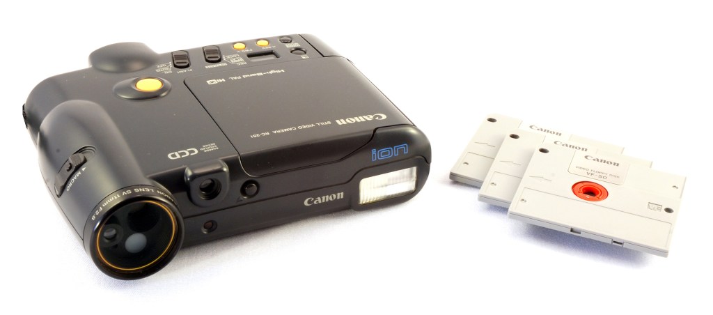 Canon iON still video camera with the discs on which images were recorded