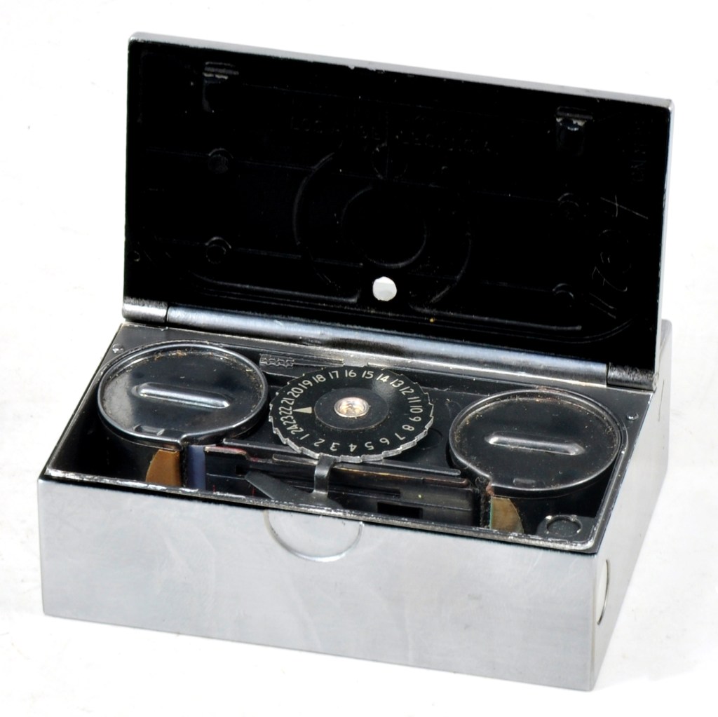Inside the camera, showing its twin cassettes and unusual film wind mechanism. Image credit: John Wade