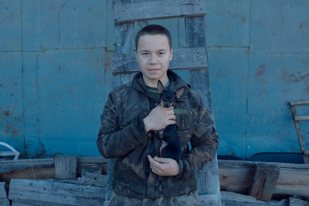  A resident of Pokhodsk holds a toy terrier – nearly every family has a pedigree dog 
for breeding and selling puppies, Sakha Republic, Russian Federation 2025. From the 
series “Inner Distance”
© Slava Lyu-fa/LOBA 2026