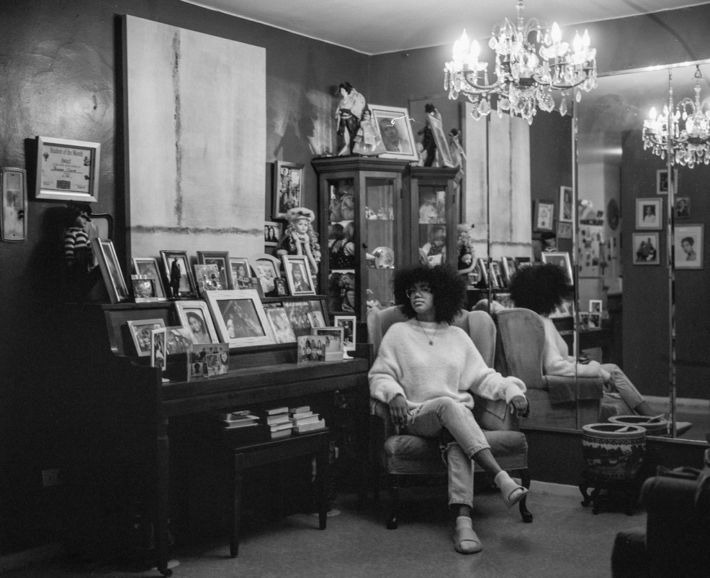 woman sat in a chair in a living room