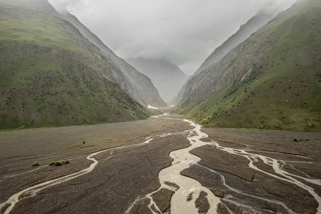 Trees grow on the former bed of Zeravshan River. Its glacier has retreated for 
nearly a kilometre in the last 20 years, Tajikistan 2021. From the series “The Aral Sea 
and the Battered Waters of Central Asia”
© Anush Babajanyan/LOBA 2026