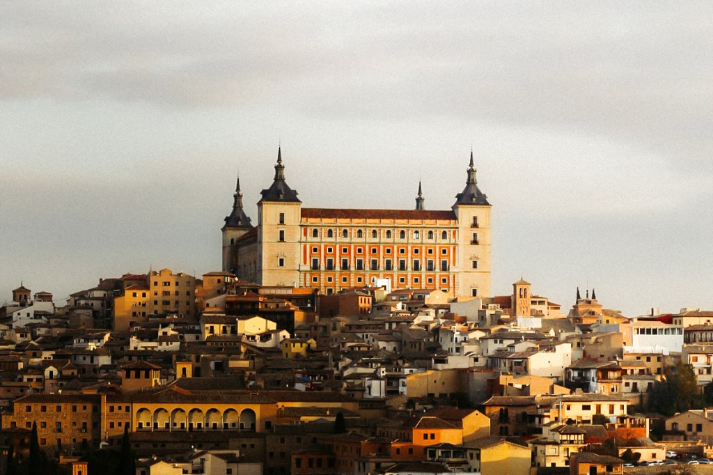 photo of a large building overlooking a city