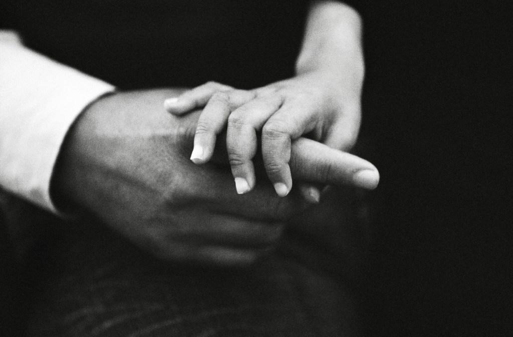 A daughter looking for security, holding onto the hand of her father, who just wanted to protect her. Palestine, 2015. Image Credit: Giles Duley