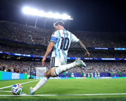 Lionel messi show just before kicking the ball out from the corner