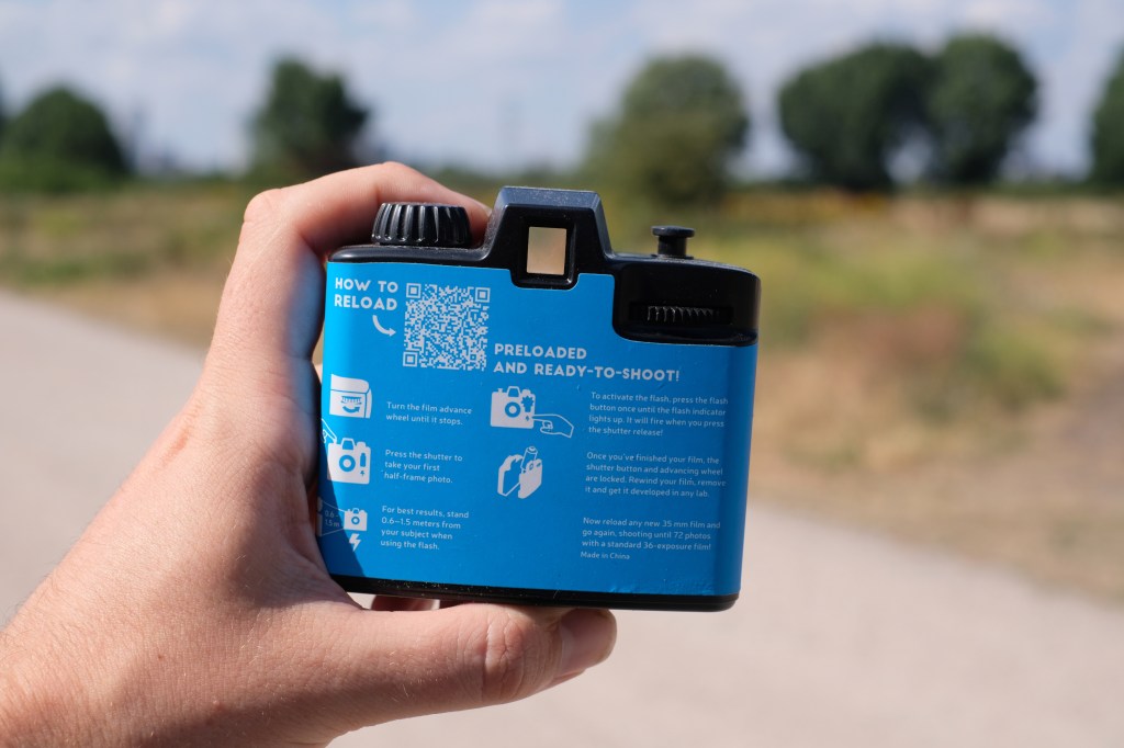 Photograph of the Lomography Half-frame Simple Use Camera rear, with written instructions and viewfinder visible