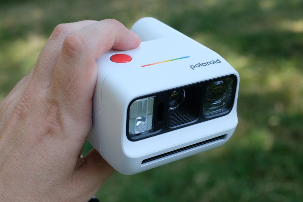 Photograph of the small Polaroid Go Gen 3 held in a man's hand