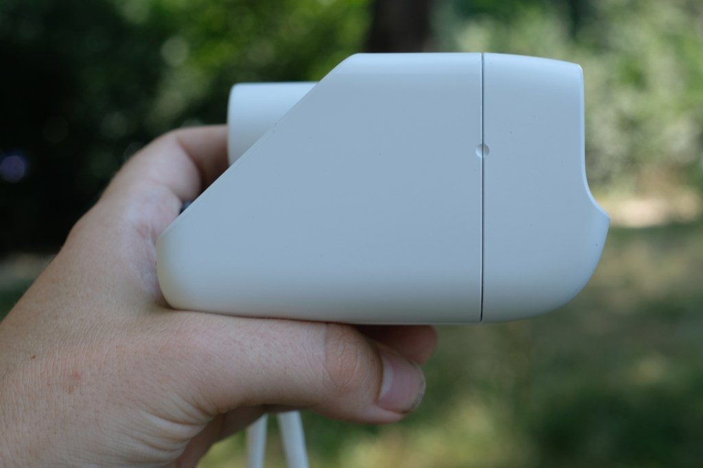Photograph of the small Polaroid Go Gen 3 held in a man's hand