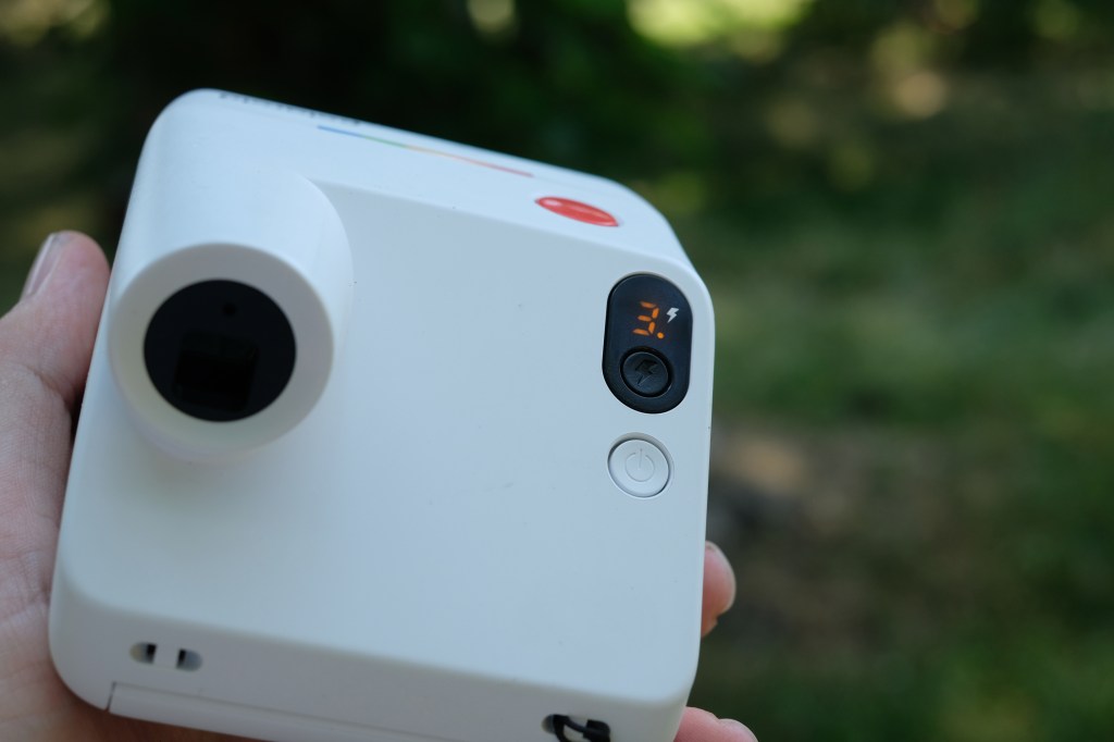 Photograph of the small Polaroid Go Gen 3 held in a man's hand
