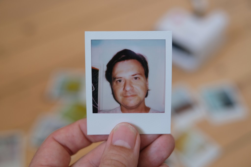 Polaroid Go selfie image, lit with flash