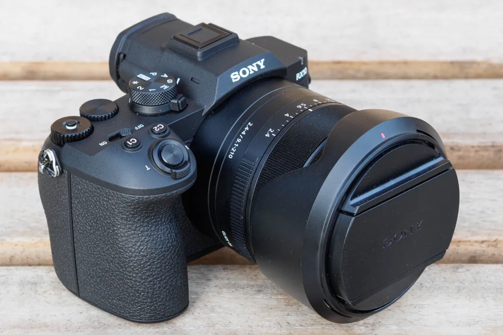 Sony RX10 V with lens cap and hood reversed.