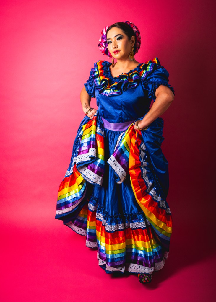 woman in traditional colourful mexican dress