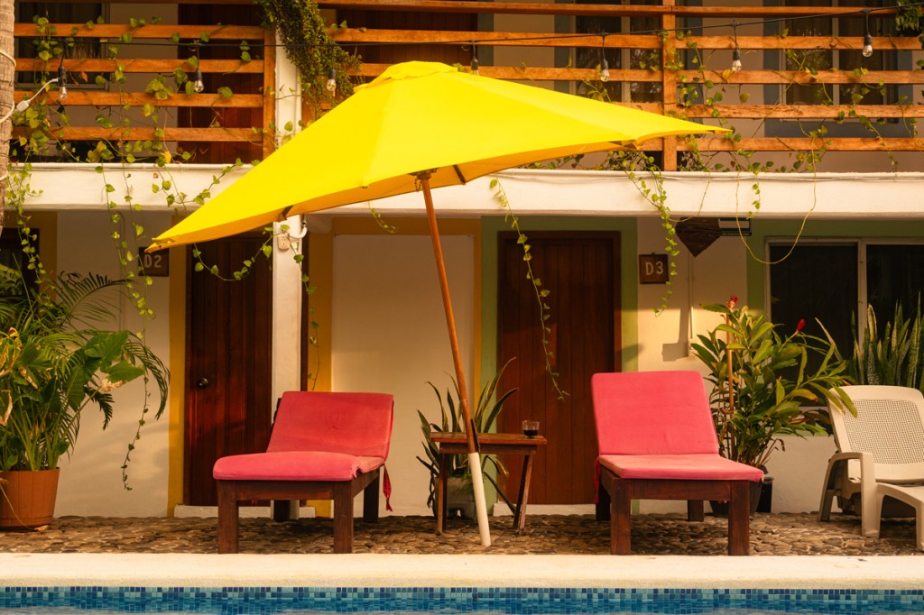 photo of two red sun loungers