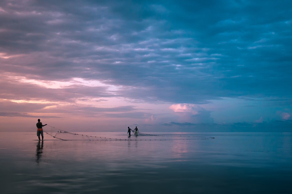 Three fishermen bring in the day’s catch on Paje Beach at Sunset Sony A7IV, Sigma 35mm f1.4 Art Lens,f2.8 at 1/5000