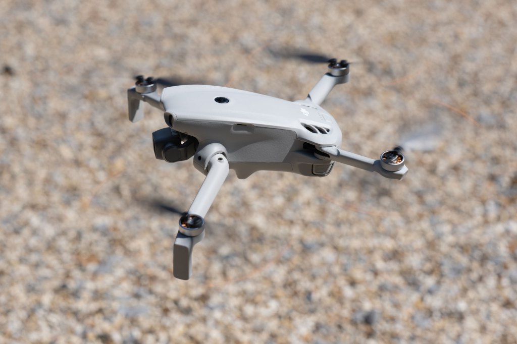 DJI Lito X1 drone in flight, three quarters view from above