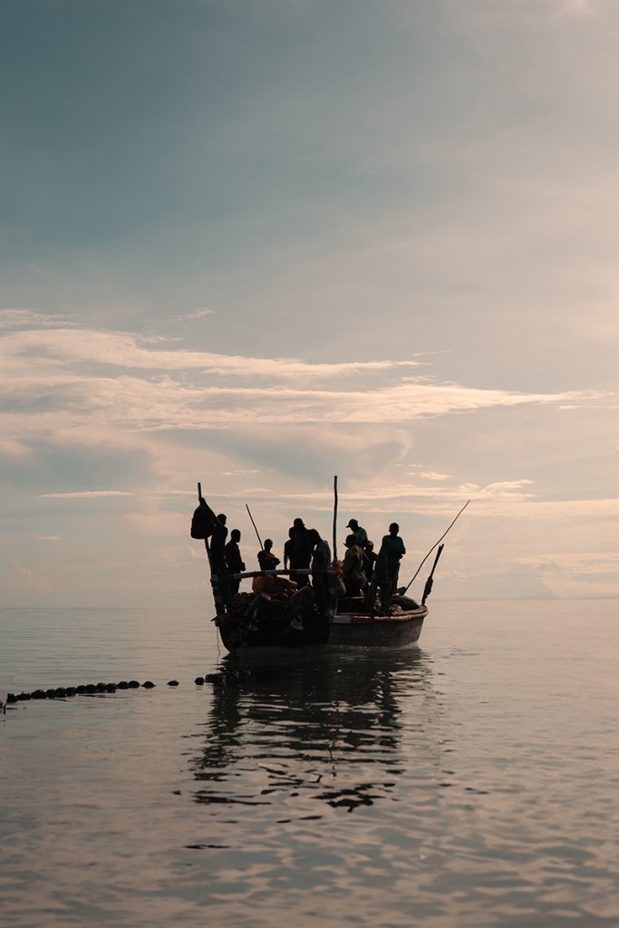 The Indian Ocean ripples softly around a packed fishing boat on the north coast of Zanzibar Sony A7IV, Sigma 35mm f1.4 Art, f2.8 at 1/5000